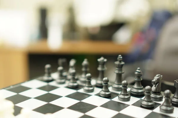 Sport Game : The image shows a chessboard ready to compete in a board game, close up.