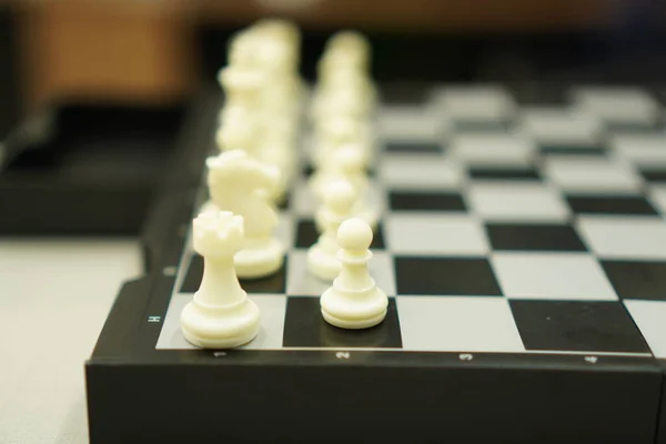 Sport Game : The image shows a chessboard ready to compete in a board game, close up.
