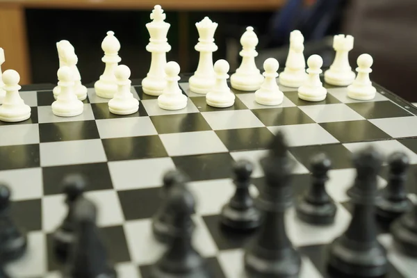 Sport Game : The image shows a chessboard ready to compete in a board game, close up.