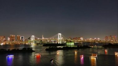 Timelapse of Rainbow Bridge and Tokyo Tower in the city japan