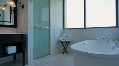 interior footage of luxury hotel suite bathroom