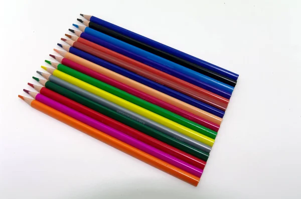 Painting Drawing Various Colored Pencils Neatly Arranged Parallel White Background — Stockfoto