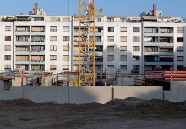 Housing: construction site with crane