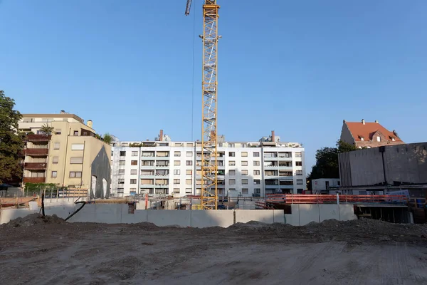 Housing: construction site with crane