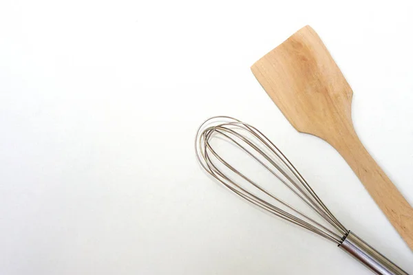 Top View Kitchen Equipment Egg Beater Wooden Spatula White Background — 图库照片
