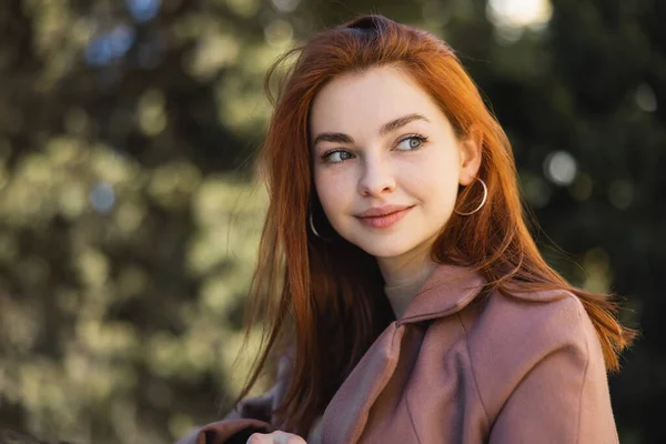 Portrait Happy Redhead Woman Coat Looking Away — стоковое фото