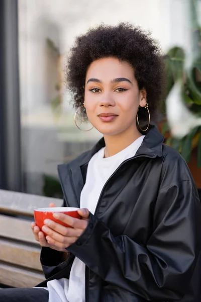 Curly Young African American Woman Jacket Holding Cup Coffee Street — Foto Stock