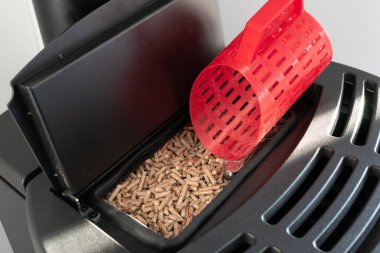 Modern yerli pelet sobası, 3 boyutlu baskılı kovalı granüller.