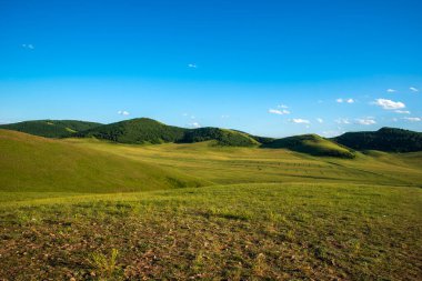 The beautiful prairies stretch as far as the eye can see