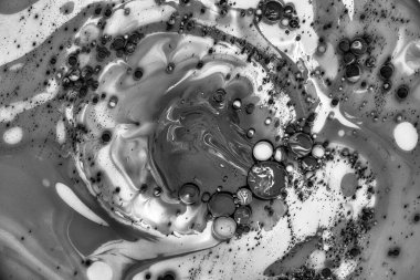 Yağla boyanın karışımı soyut bir görüntü oluşturuyor..