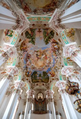 Bad Schussenried, Steinhausen, GERMANY, JUNE 09, 2022: Ceiling Arts and pipe organ of the Church St. Peter and Paul