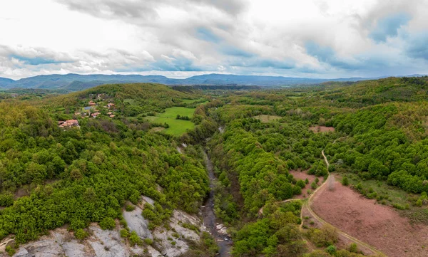 Panorama of a valley with waterfall, top view. Travel in Bulgaria. Hristovski waterfall