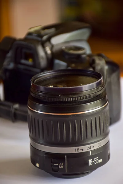 lens and camera on white background light soft