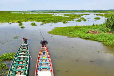 fisherman's wooden boat in a lake in Phatthalung