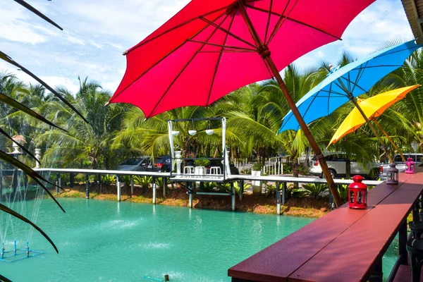 Coconut Trees Colorful Umbrellas Fountains Tourists Sit Relax — Stock Photo, Image