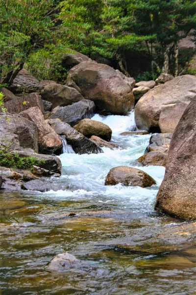 Big stone rock and waterfall beauty nature in south Thailand