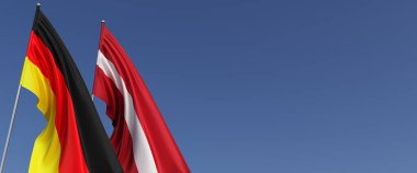 Bayrak direğinde Almanya ve Letonya bayrakları var. Mavi arka planda bayraklar. Mesaj için yer. Berlin, Münih. Riga, Baltık Eyaletleri. Bağımsız Devletler. 3B illüstrasyon.