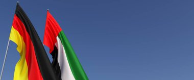 Bayrak direğinde Almanya ve BAE bayrakları var. Mavi arka planda bayraklar. Mesaj için yer. Alman, Berlin. Birleşik Arap Emirlikleri. 3B illüstrasyon.