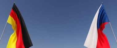 Bayrak direğinde Almanya ve Çek Cumhuriyeti bayrakları var. Mavi arka planda bayraklar. Mesaj için yer. Berlin, Münih. Prag, Avrupa. Bağımsız Devletler. 3B illüstrasyon.