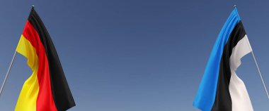 Bayrak direğinde Almanya ve Estonya bayrakları var. Mavi arka planda bayraklar. Mesaj için yer. Berlin, Münih. Tallinn, Baltık Birliği. Bağımsız Devletler. 3B illüstrasyon.