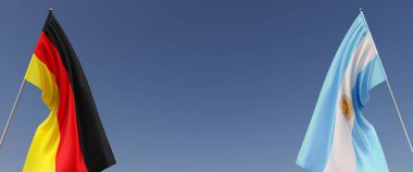 Mavi arka planda bayrak direkleri üzerinde Almanya ve Arjantin bayrakları. Mesaj için yer. Rüzgarda dalgalanan bayraklar. Alman, Berlin. Buenos Aires. 3d illüstrasyon.