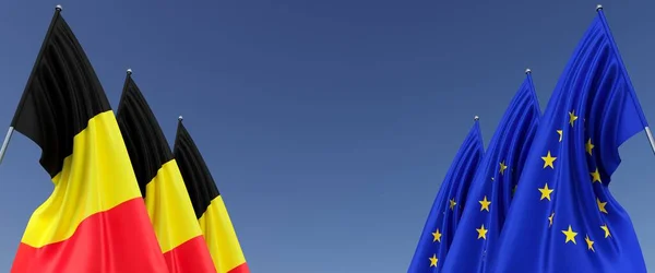 Flags of the EU and Belgian on flagpoles on the sides. Flags on a blue background. Place for text. European Union. Belgian flag. Brussels. Commonwealth. 3D illustration.