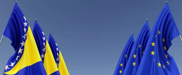 欧洲联盟和波斯尼亚和黑塞哥维那的三面旗帜挂在两边的旗杆上 蓝色背景上的横幅 文字的位置 萨拉热窝 英联邦 3D插图 — 图库照片