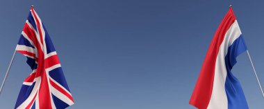 Büyük Britanya ve Hollanda 'nın bayrakları bayrak direğine asıldı. Mavi arka planda bayraklar. Mesaj için yer. Hollanda. Amsterdam mı? İngiltere, Londra. Bağımsız Devletler. 3B illüstrasyon.