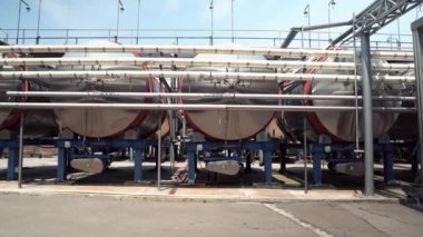 Horizontal containers for fermentation of red wines at the Shabo plant. Fermentation and storage of wines in stainless steel venifiers. Grape processing.