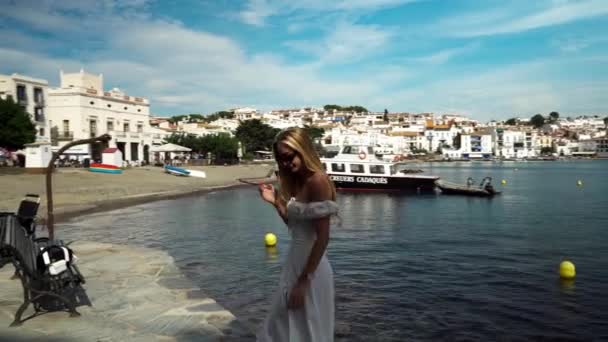 Young Girl White Dress Poses Photographer Backdrop Sea Coastal City — Stock Video