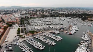 Drone shot of the old city of Antibes. Cote d'Azur of the Mediterranean Sea of France. Resort on the French Riviera Antibes.View from the drone yachts moored in the city marina.