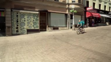 Central street with cafes and restaurants in Zagreb. Colorful streets with people in Zagreb. Souvenir shops in Croatia. Ban Josip Jelacic Square in Zagreb