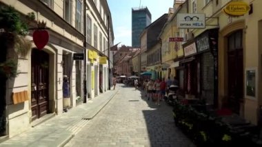 Central street with cafes and restaurants in Zagreb. Colorful streets with people in Zagreb. Souvenir shops in Croatia. Ban Josip Jelacic Square in Zagreb