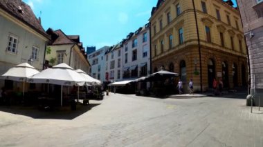 Central street with cafes and restaurants in Zagreb. Colorful streets with people in Zagreb. Souvenir shops in Croatia. Ban Josip Jelacic Square in Zagreb