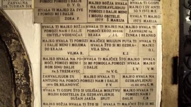 Stone gate Zagreb. Commemorative stone tablets. The icon of the Mother of God that survived the fire in Zagreb. Chapel of Our Lady of the Stone Gate Zagreb. 