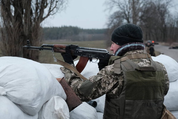 Hostroluchchya, Ukraine: 6 March 2022: territorial defence fighter with weapon