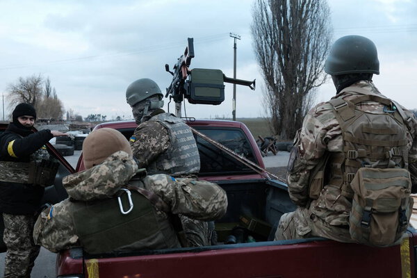 Hostroluchchya, Ukraine: 8 March 2022: territorial defence fighters in ukrainian village