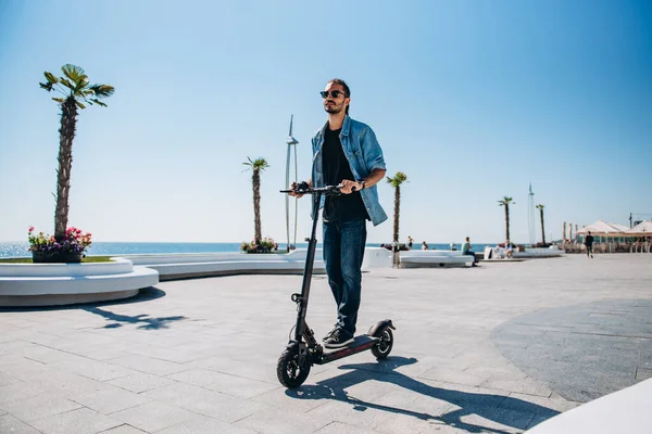 Man Riding Scooter Sunny Embankment Sky Man Boy San — Stock Photo, Image