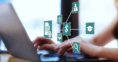 Human using a computer laptop for searching for job and fill out personal data on job website to file a resume and apply application to jobs on the internet. work search online concept.