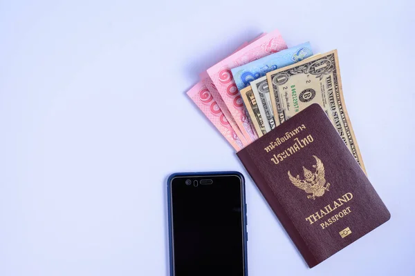 Passports and money and telephone for travel.