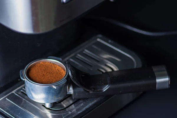 Espresso coffee from a drip-glass coffee machine