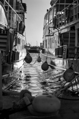 Boats side protection called Fenders.In black and white.