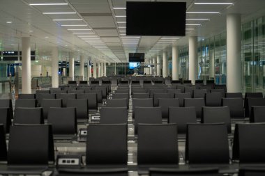 Germany Munich airport the empty passenger seats at night.