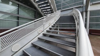 white colored metal stairs in day daylight