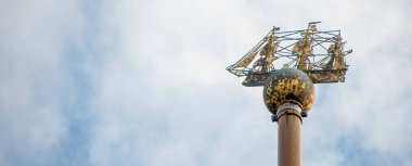 ship statue on top of  Hamburg City Hall 