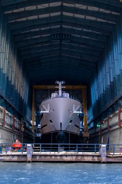 Shipbuilding in the north Elbe river at a large shipyards specializing in iron shipbuilding.