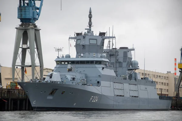 German military ship front view showing the German flag.