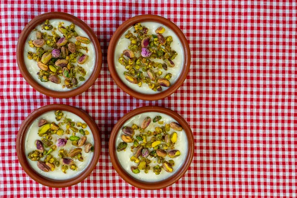 Milk Rice in pottery bowl flat lay, copy space.