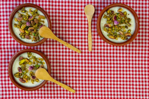Milk Rice in pottery bowl flat lay, copy space.