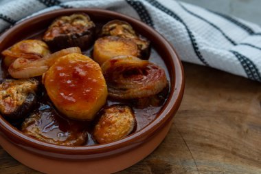 Kwaj a dish, prepared from a mix of vegetables ,tomato, zucchini, eggplant, potato, onion and green pepper and meat all together cooked in the oven.
